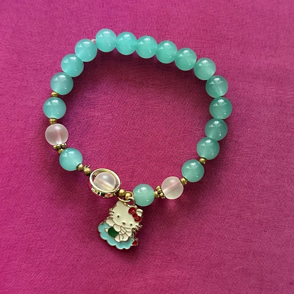 HELLO KITTY TEAL BRACELET USED